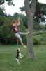 Bayley and girl hanging from tree