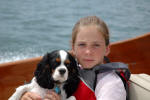 Bayley held by Lillian in sailboat